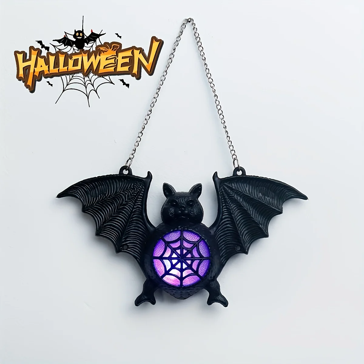 Lámpara murciélago LED para colgar de Halloween con luz violeta multicolor y diseño de telaraña.