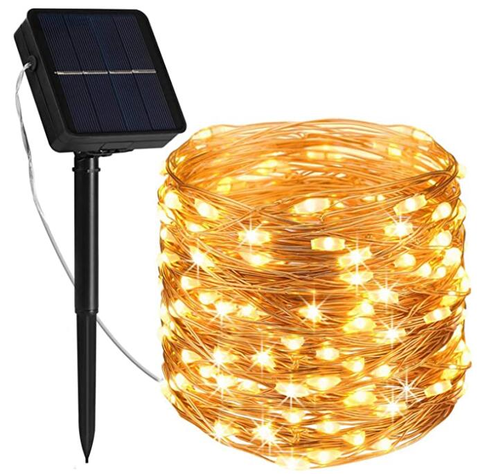 Guirnalda de luces navideñas solares LED cálidas de 10 metros con panel solar y estaca para jardín.